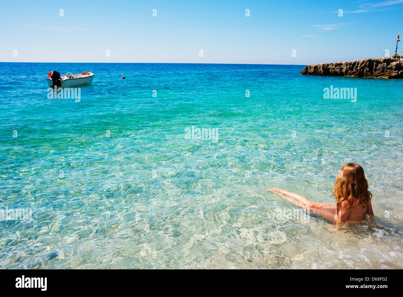 Europe, Albania, Mediterranean Sea, Dhermi, girl on a beach Stock Photo