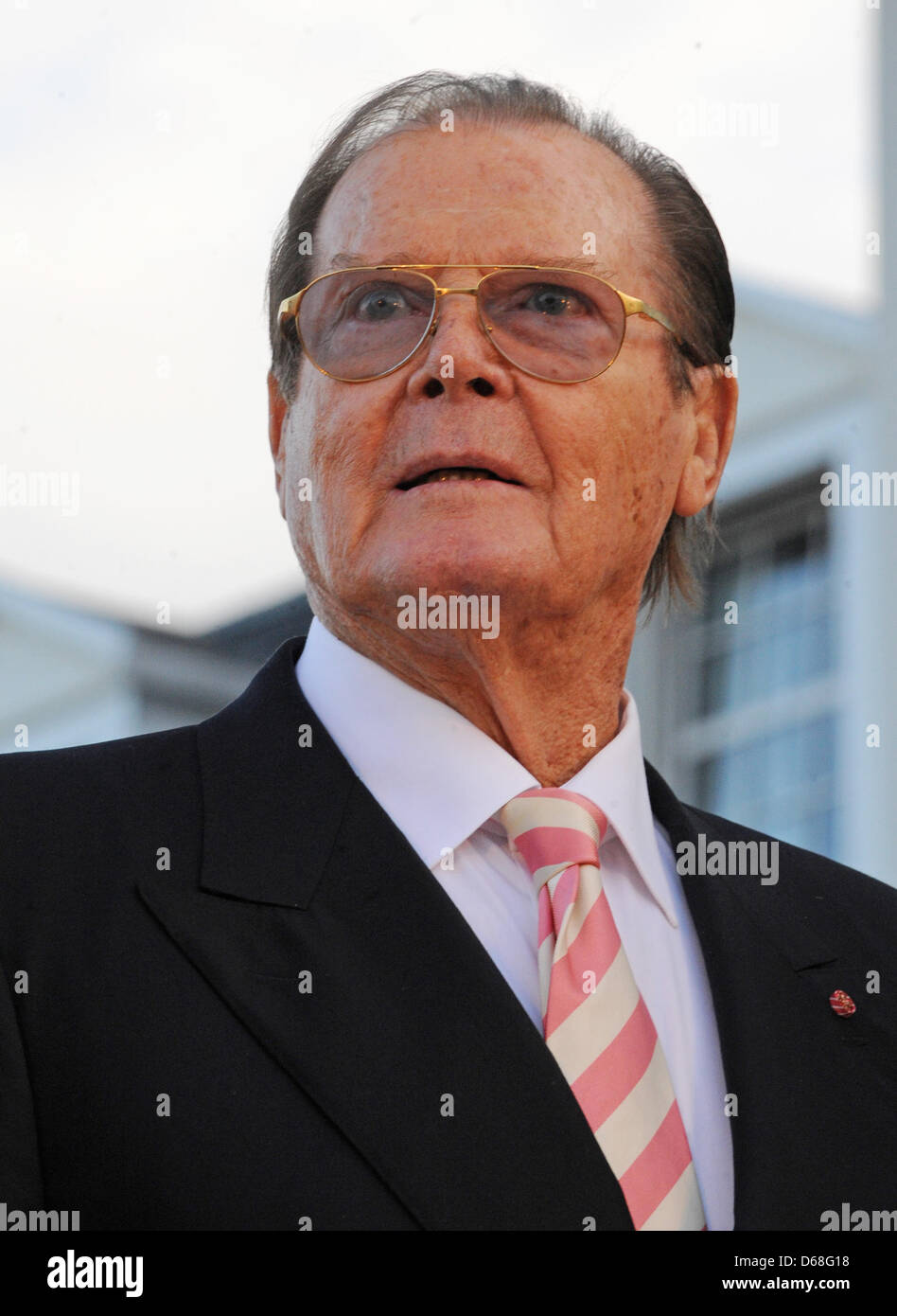 British actor Sir Roger Moore attends the opening of the hotel 'Bell Rock' at amusement park 'Europapark' in Rust, Germany, 12 July 2012. Photo: Patrick Seeger Stock Photo
