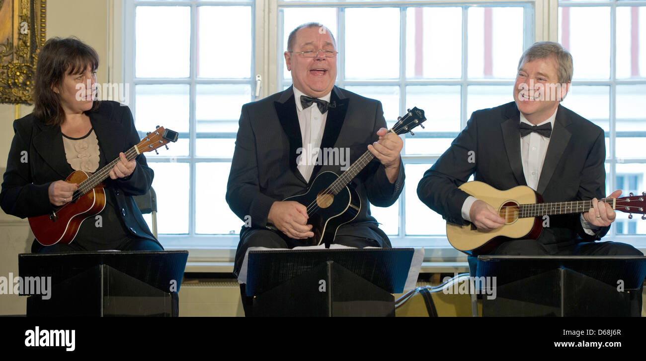 Members of the 'Ukulele Orchestra of Great Britain' perform during a press  conference in Berlin, Germany, 16 July 2012. The ensemble presented its new  album 'Uke-Werk - Live in Germany' which will