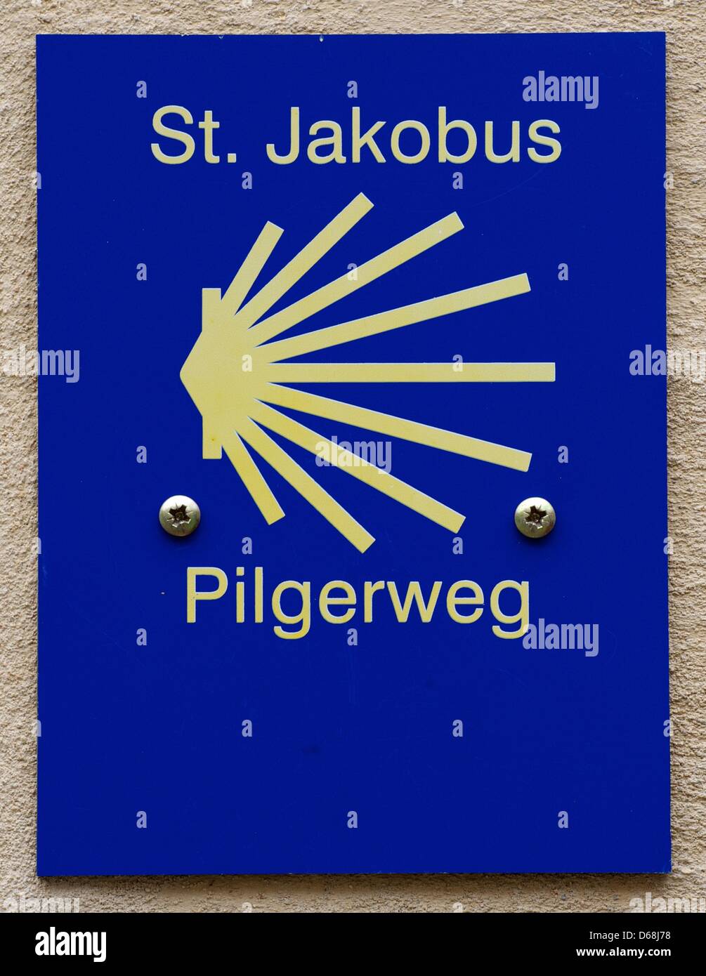 The sign of the Way of St. James pilgramage route pictured in Eisleben, Germany, 16 July 2012. Photo: Peter Endig Stock Photo