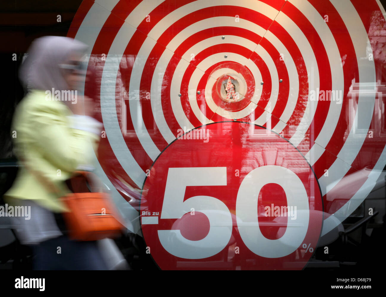 Clothing shops advertise their promotional sales in Duesseldorf