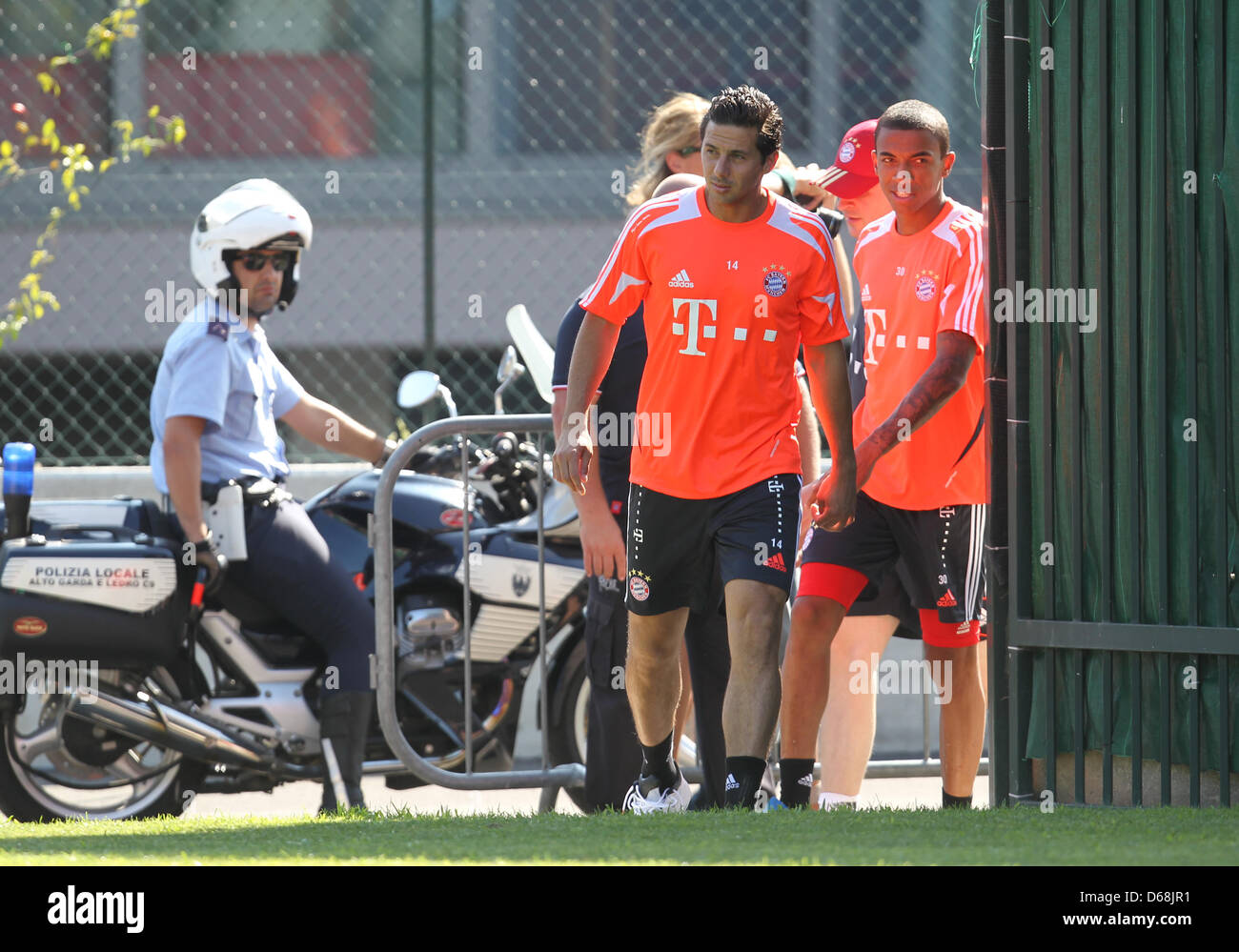 Claudio Pizarro M And Luiz Gustavo R Of German Bundesliga Club Fc Bayern Munich Arrive For A Training Session At The Bundesliga Club S Training Camp In Arco Italy 16 July 12 Until