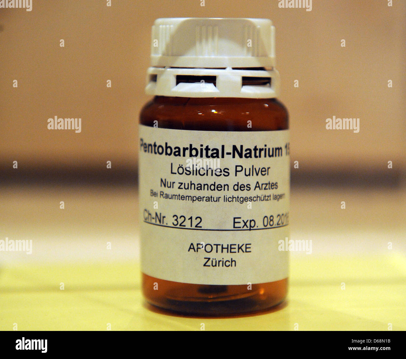 An empty bottle of pentobarbital-sodium is on display at the Augustiner Museum in Freiburg, Germany, 02 July 2012. The lethal chemical is used by doctors of the Swiss assisted dying organisation 'Dignitas' for assisted suicides. The decision on assited dying in Germany will for the time being not be made in Strasbourg. The European Court of Human Rights (EGMR) limited its verdict o Stock Photo