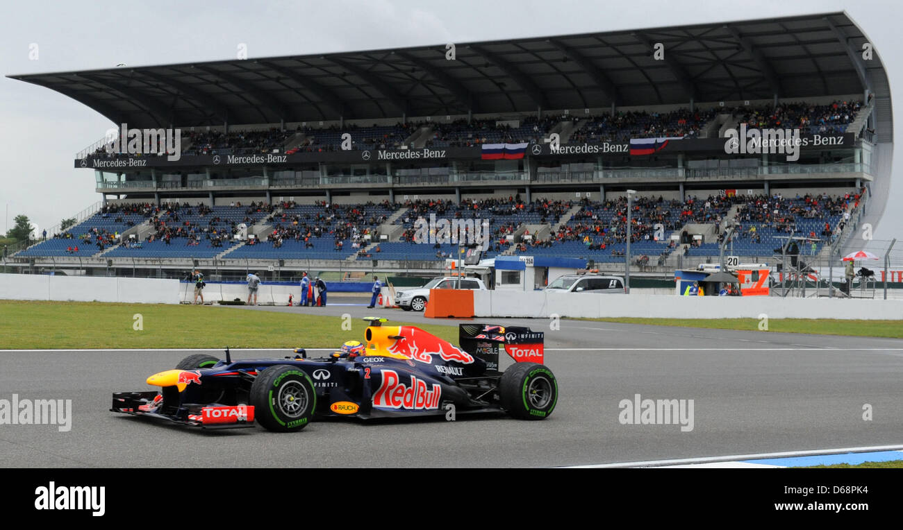Australian Formula One driver Mark Webber of Red Bull steers at the ...