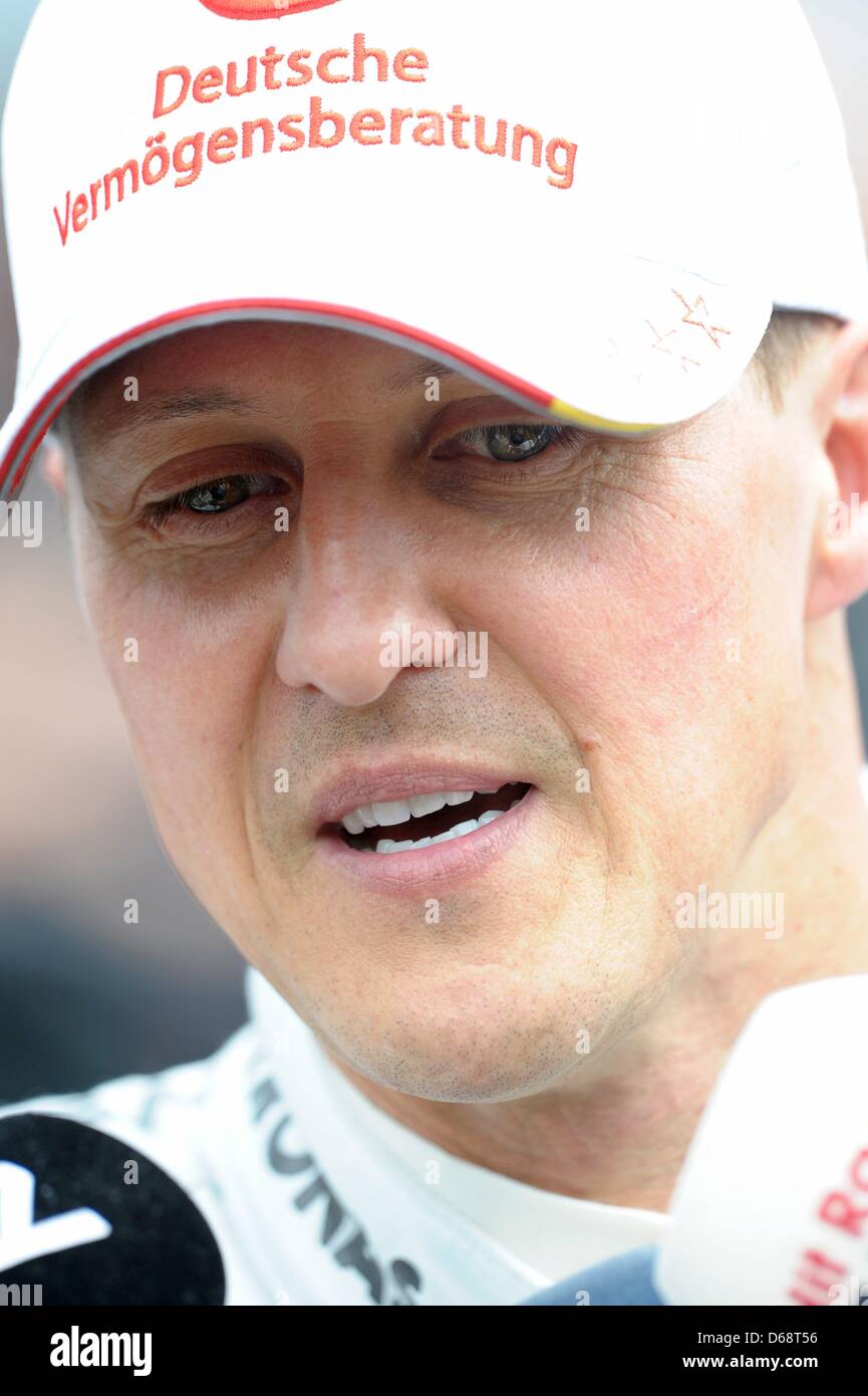 German Formula One driver Michael Schumacher of Mercedes AMG talks to ...