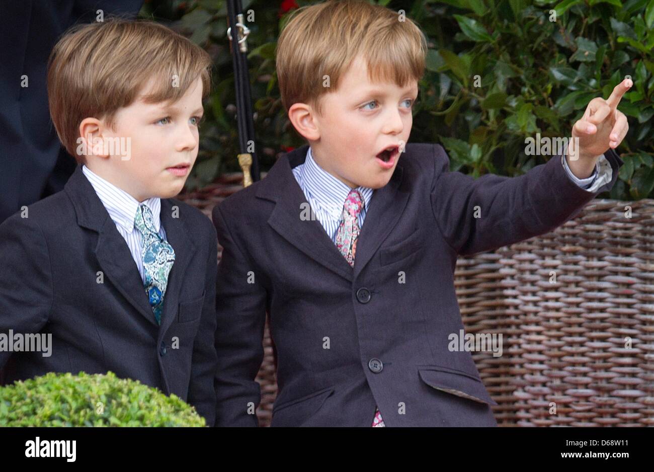 The twins Prince Nicolas and Prince Aymeric of Belgium attend the military  parade on the occasion