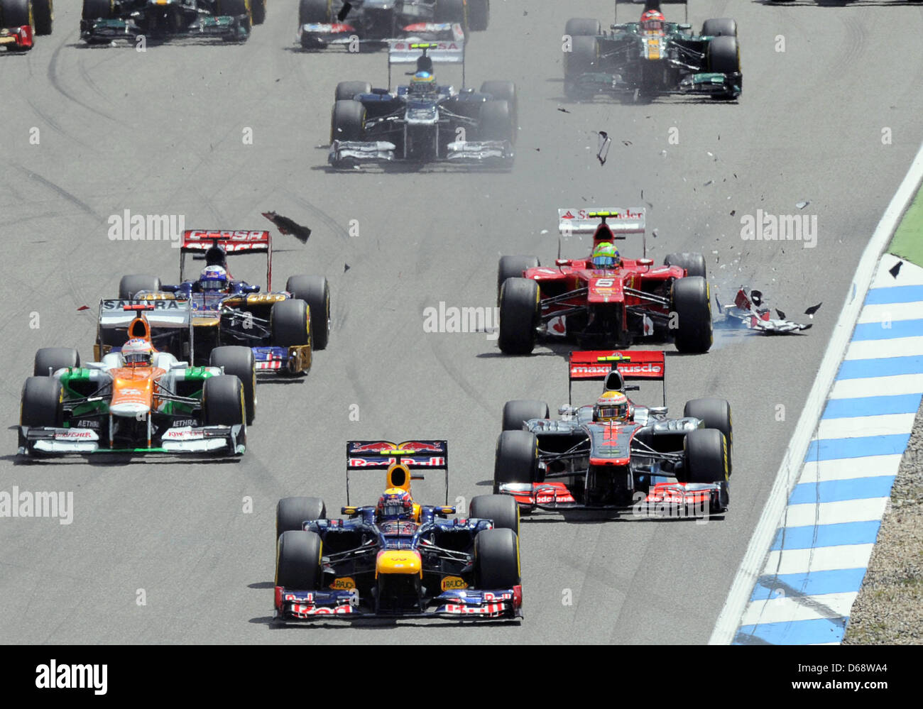 Brazilian Formula One driver Felipe Massa (C) of Ferrari after his ...