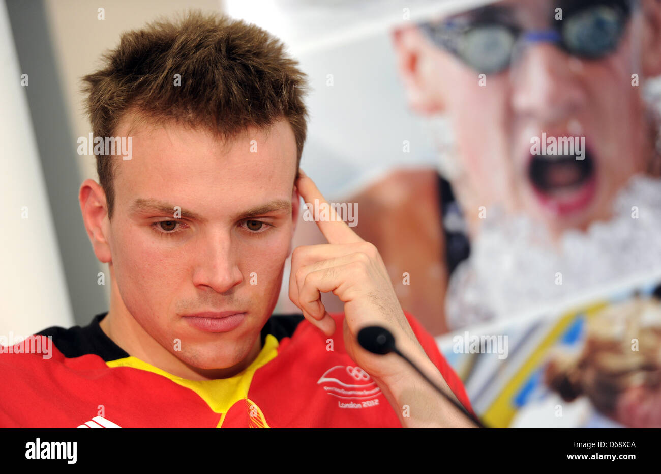 German swimmer Paul Biedermann gestures at a press conference of the