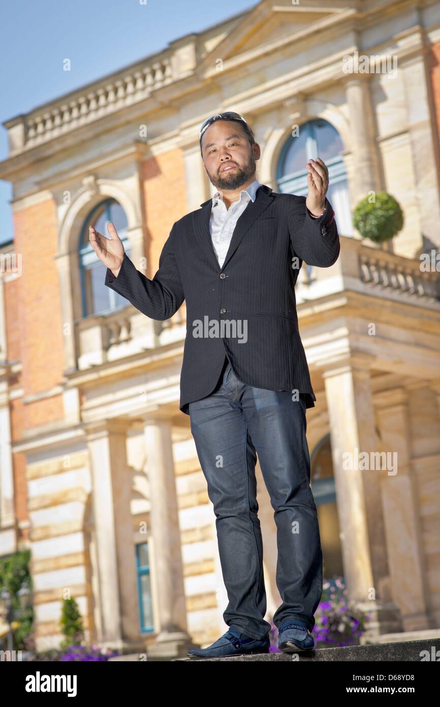 Bassbaritone opera singer Samuel Youn poses in front of the Festspielhaus in Bayreuth, Germany