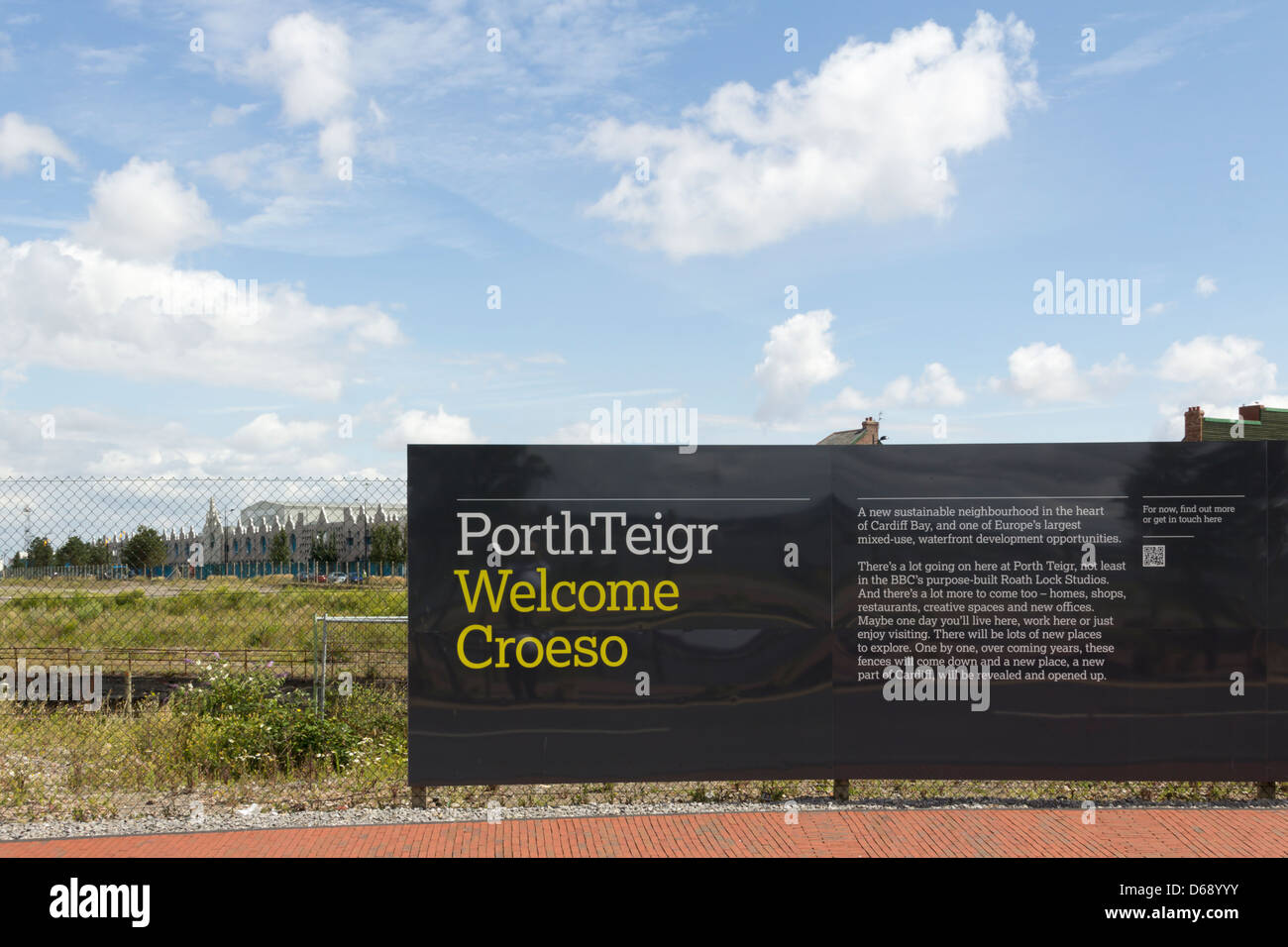 A welcome sign and information billboard of Igloo Regeneration Partnership on the brownfield site of Porth Teigr, Cardiff Bay. Stock Photo
