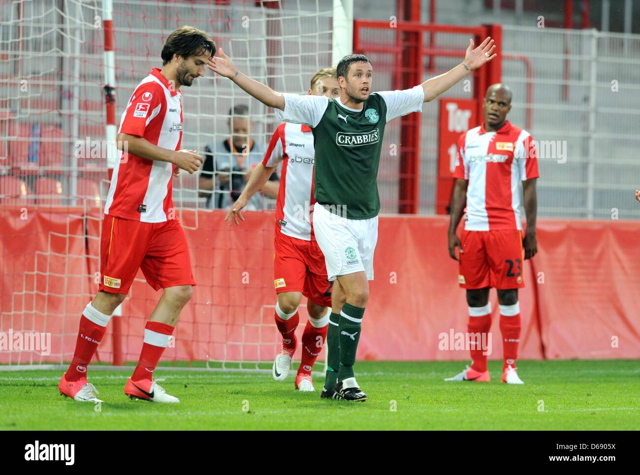 Edinburgh's Tim Clancy (C) gestures during the soccer test match between FC Union Berlin and Hibernian Edinburgh FC at the Stadium An der Alten Foersterei in Berlin, Germany, 24 July 2012. Photo: Oliver Mehlis# Stock Photo