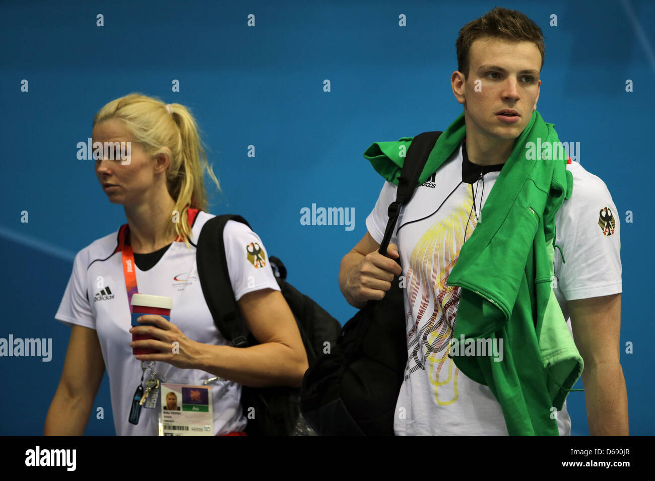 Britta Steffen (L) and Paul Biedermann of the German Olympic swimming team  seen during a training session at Aquatics Centre in London, Great Britain,  25. July 2012. The London 2012 Olympic Games