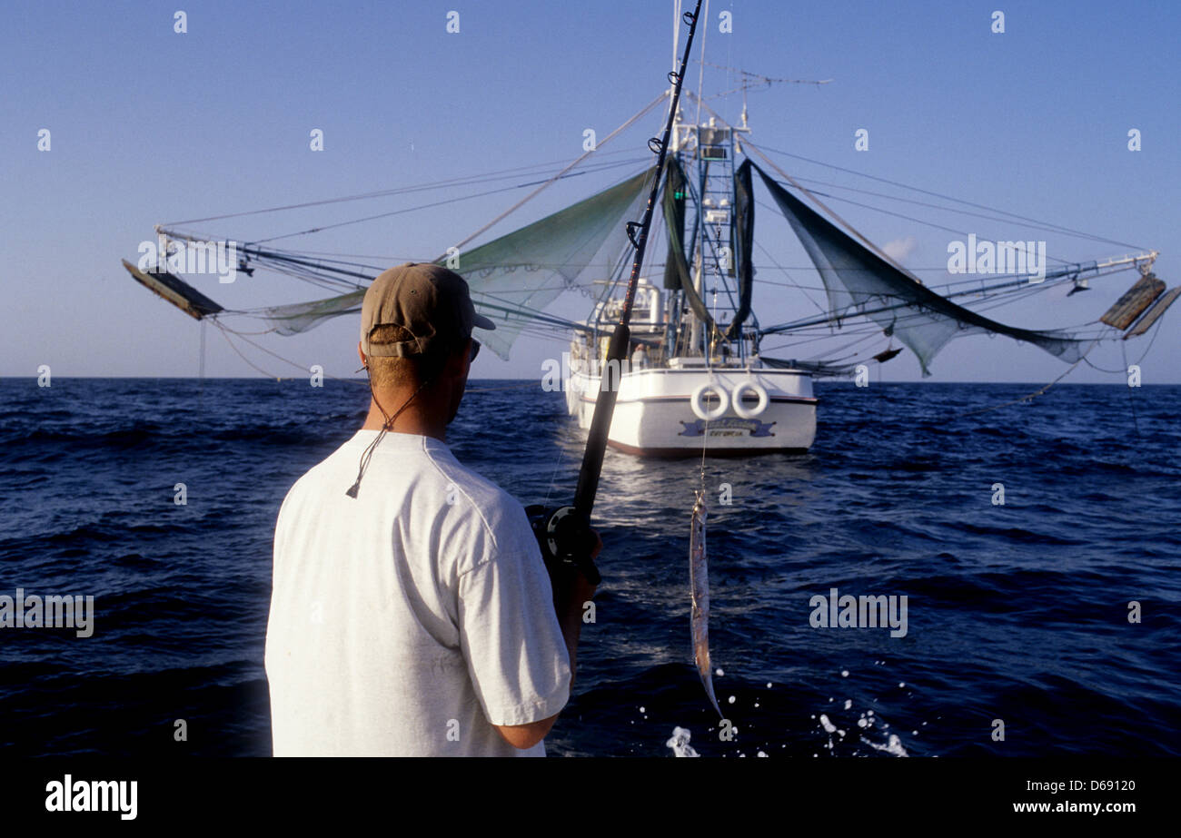 Shrimp boat trolling fishing near hi-res stock photography and images ...