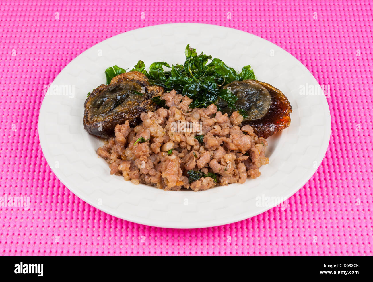 Fried century egg with pork and crispy basil leaf Stock Photo Alamy