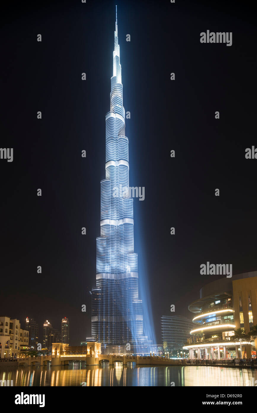 Night view of floodlit Burj Khalifa Tower in Dubai United Arab Emirates Stock Photo