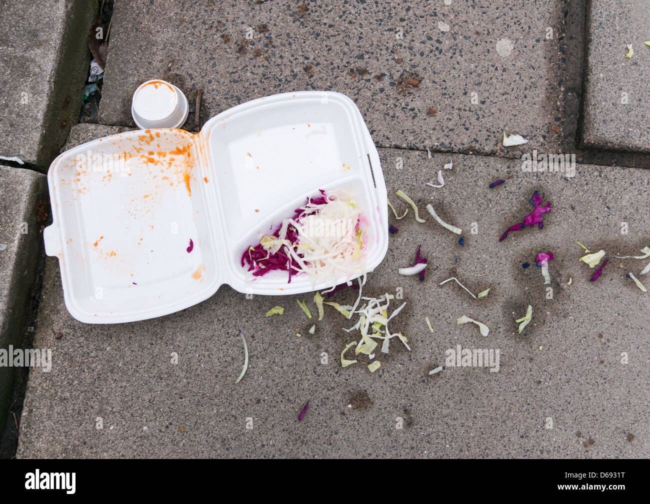 Discarded take away food container on pavement, north east England UK Stock Photo