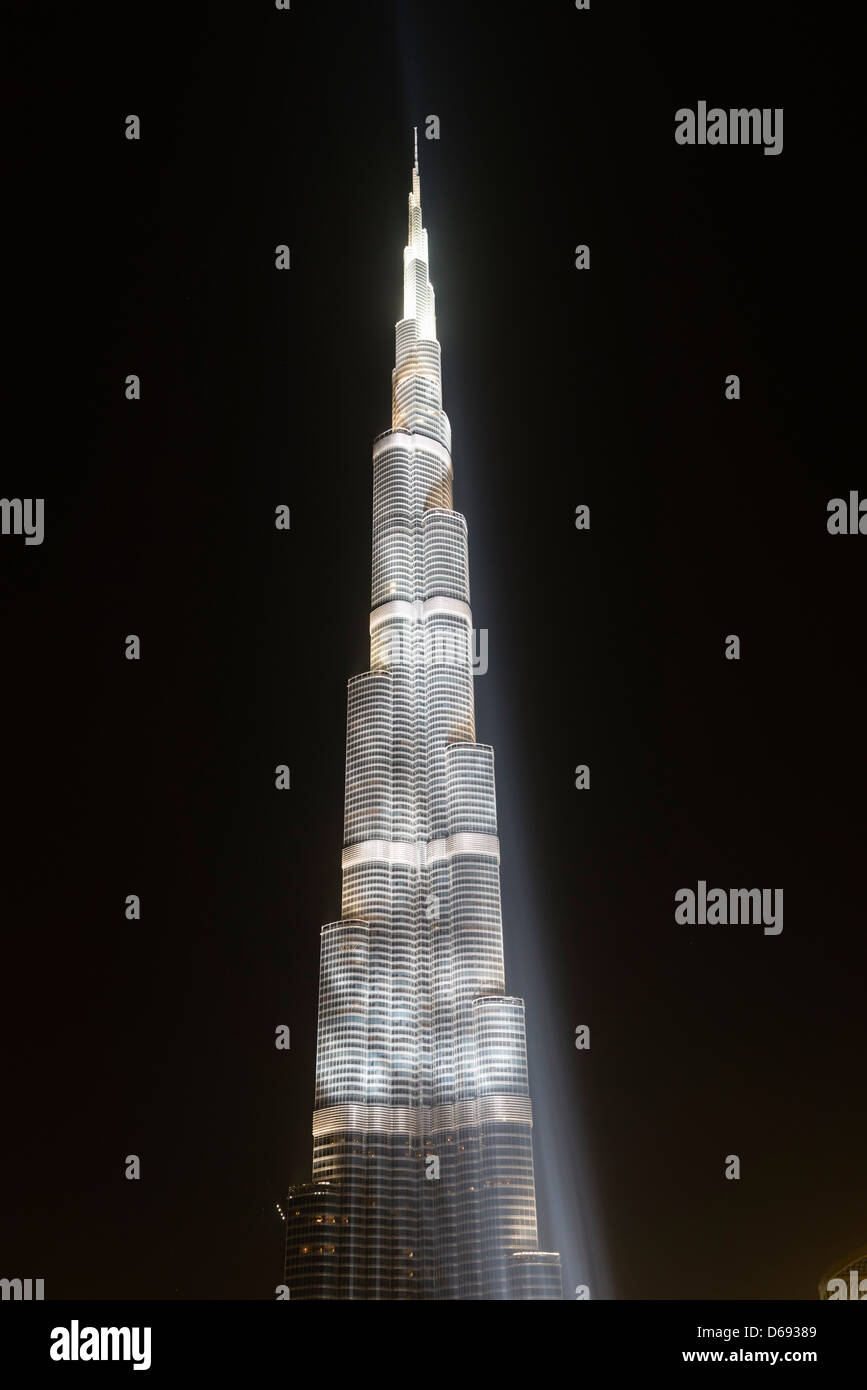 Night view of floodlit Burj Khalifa Tower in Dubai United Arab Emirates Stock Photo