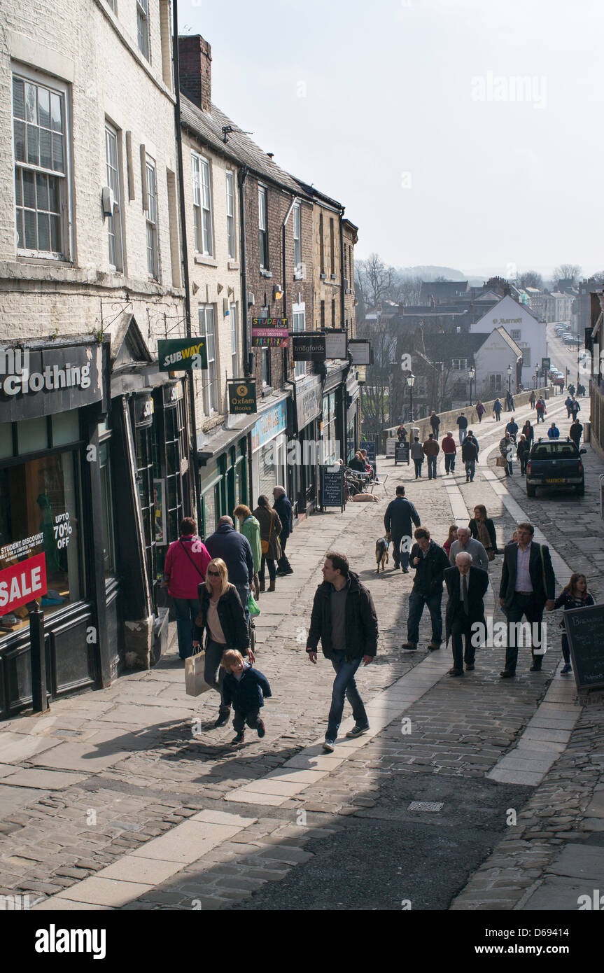 People walking along Elvet Bridge Durham city centre, north east England UK Stock Photo