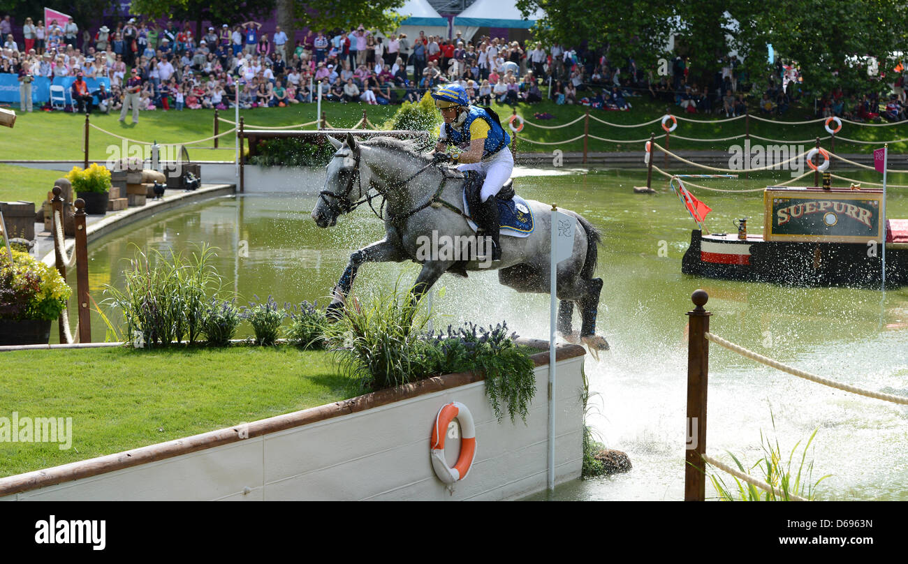 Swedish eventing rider Sara Algotsson Osthold rides her horse Wega in ...
