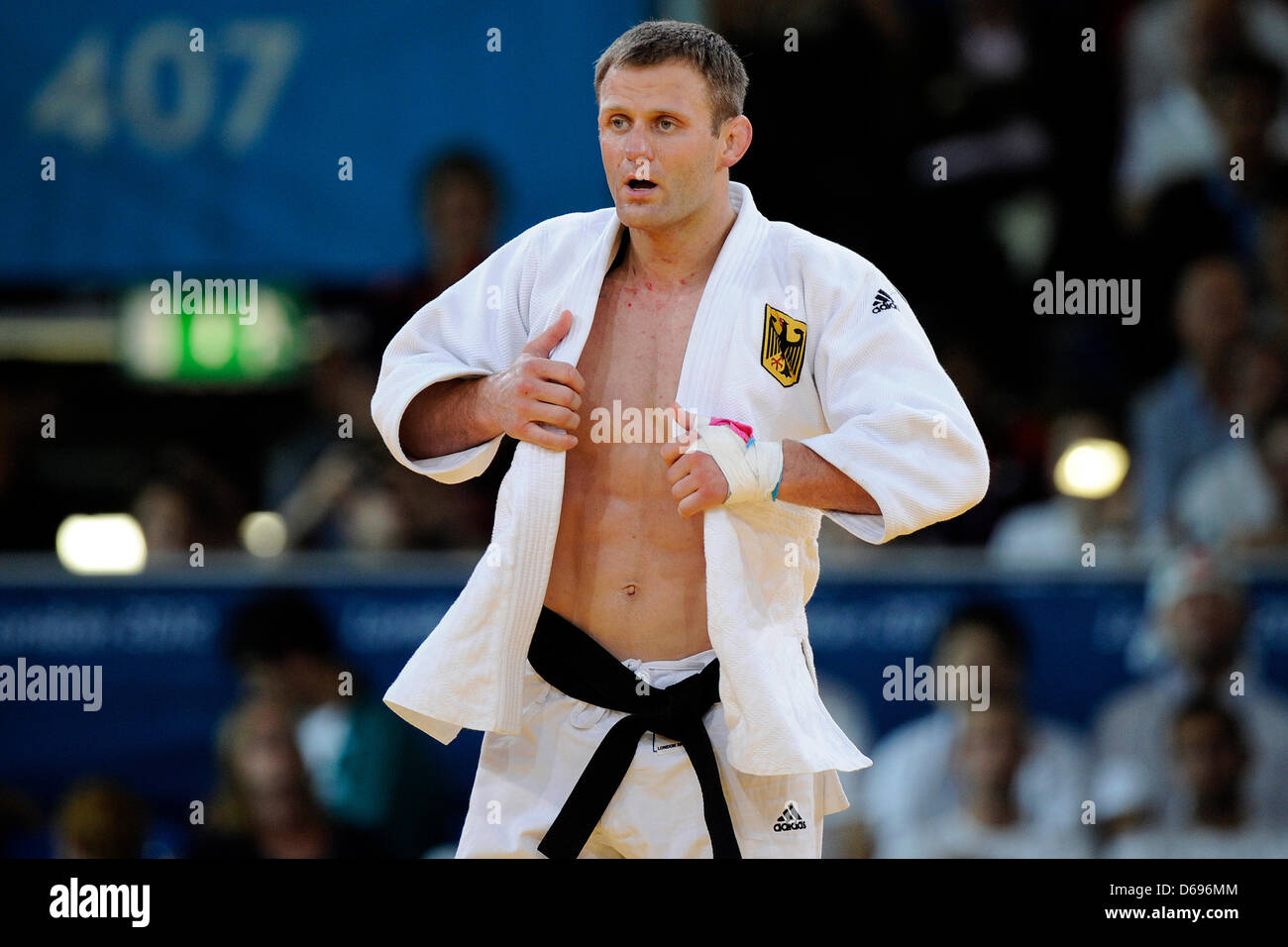 Germany's judoka Ole Bischof reacts after the final match of the Men's -81kg judo event against Jae-Bum of South Korea in the ExCeL Arena at the London 2012 Olympic Games, London, Great Britain, 31 July 2012. Photo: Marius Becker dpa  +++(c) dpa - Bildfunk+++ Stock Photo