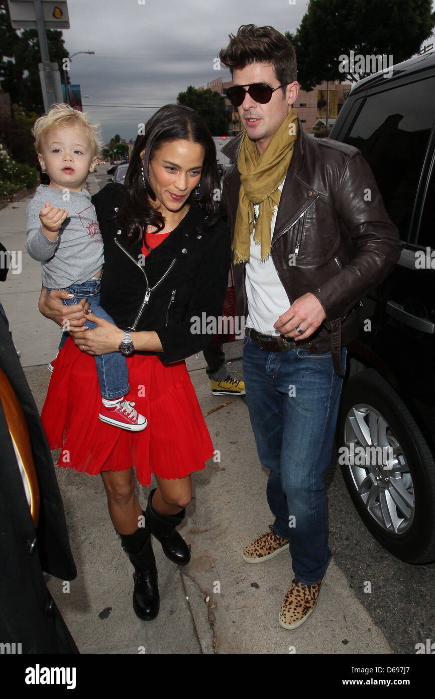 Robin Thicke, Paula Patton, son Celebrities arrive at the 'Harajuku