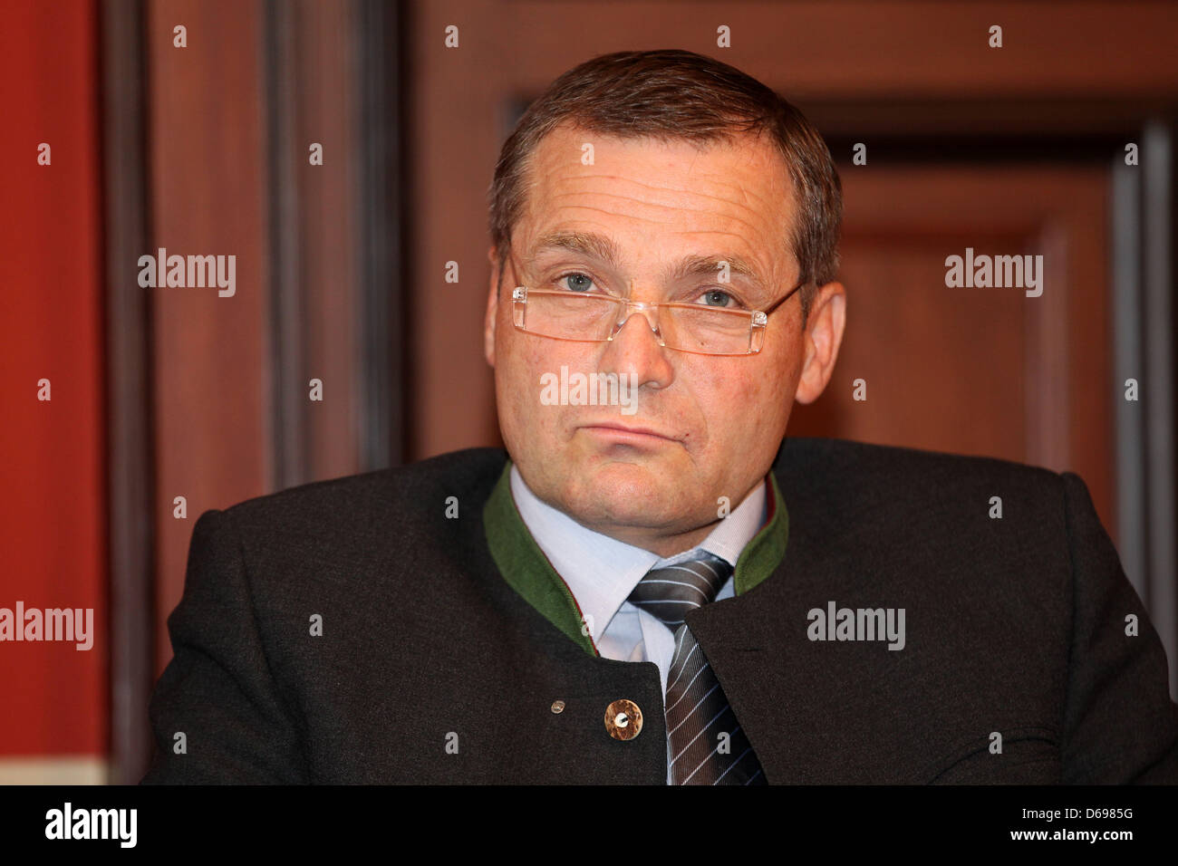 Chairman of the German far-right party NPD Udo Pastoers sits in the docks of the Regional Court in Schwerin, Germany, 02 August 2012. Pastoers is accused of the defamation of the memory of the dead and slander. Photo: JENS BUETTNER Stock Photo