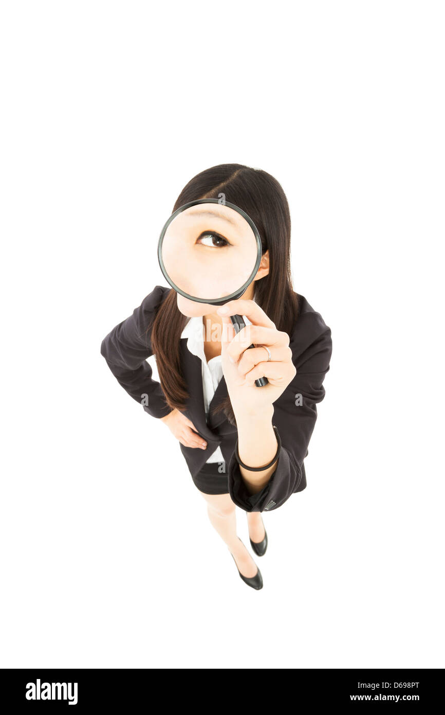 Young business Woman holding Magnifying Glass Stock Photo - Alamy