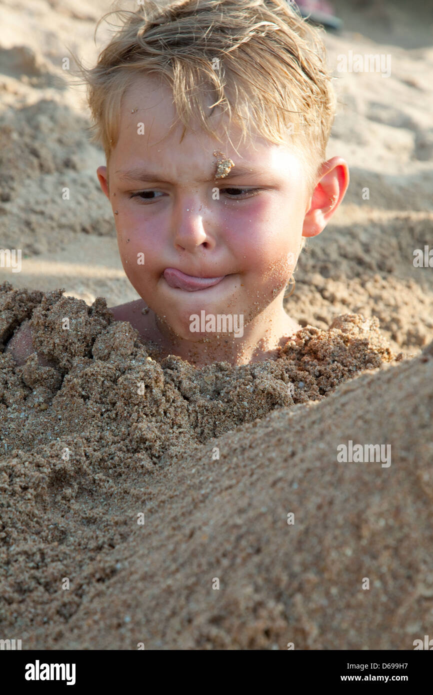 The Funny Boy In Sand Stock Photo Alamy