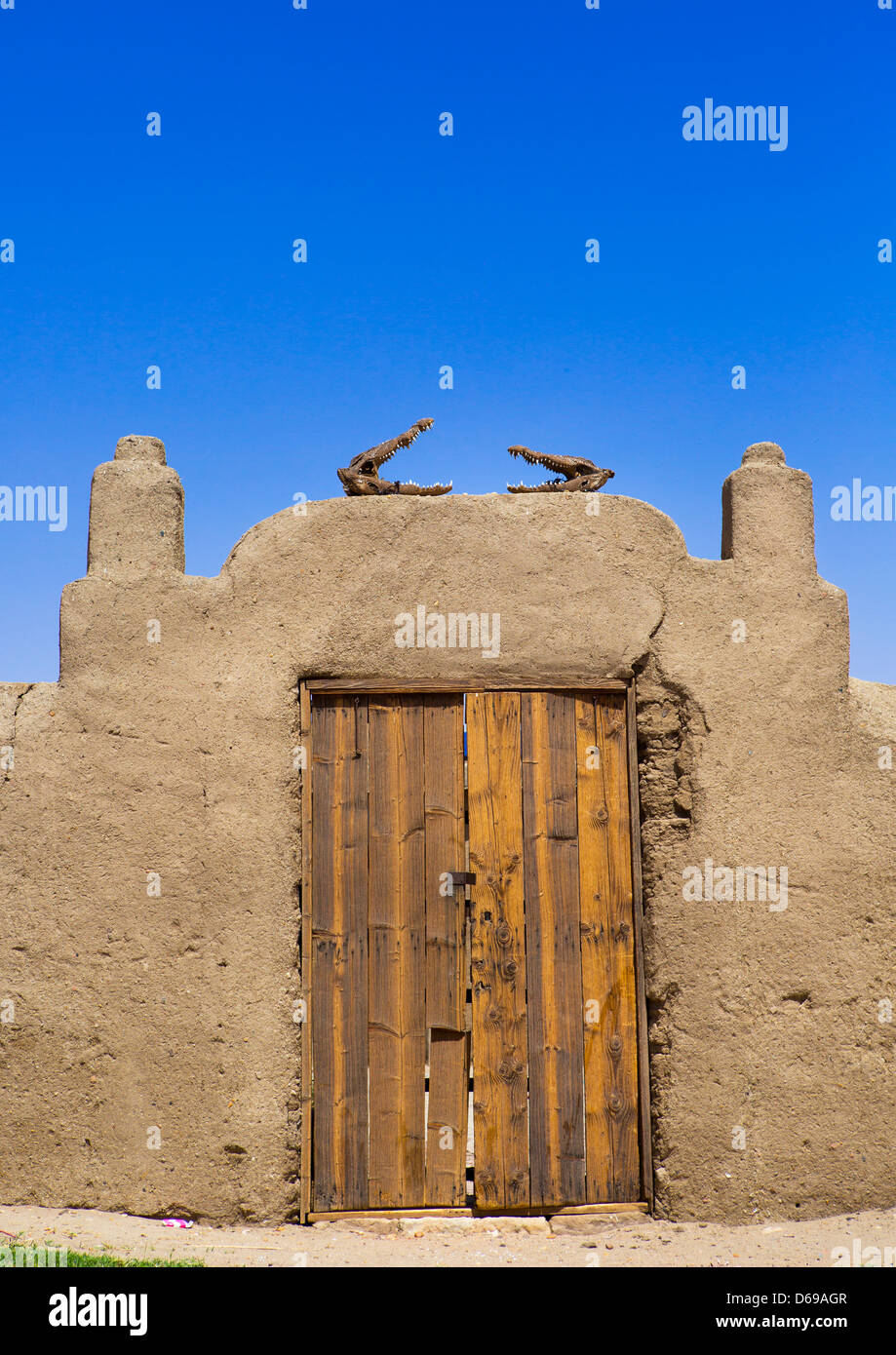 Crocodiles Heads On A Door, Sai Island, Sudan Stock Photo