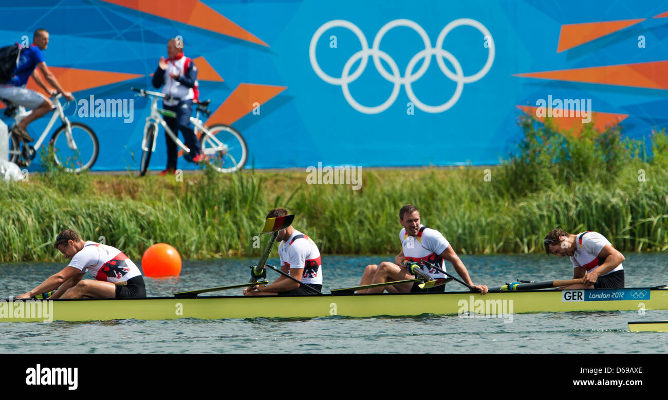 Gregor Hauffe, Toni Seifert, Urs Kaeufer, Sebastian Schmidt of Germany react during the Men's Four of the Rowing event in Eton Dorney at the London 2012 Olympic Games, London, Great Britain, 04 August 2012. Photo: Peter Kneffel dpa  +++(c) dpa - Bildfunk+++ Stock Photo