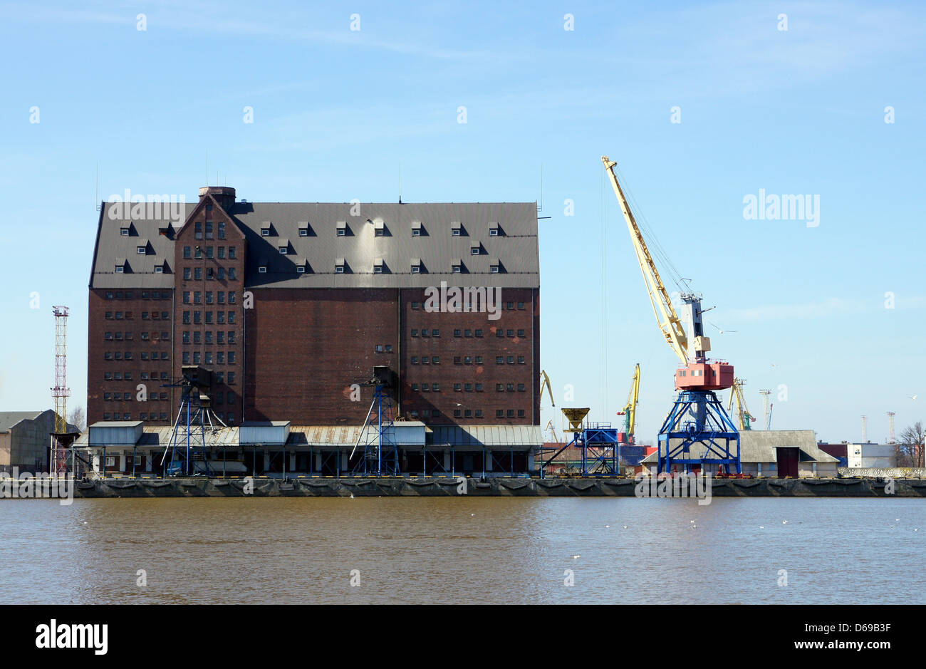 Port granary on a background of the blue sky Stock Photo
