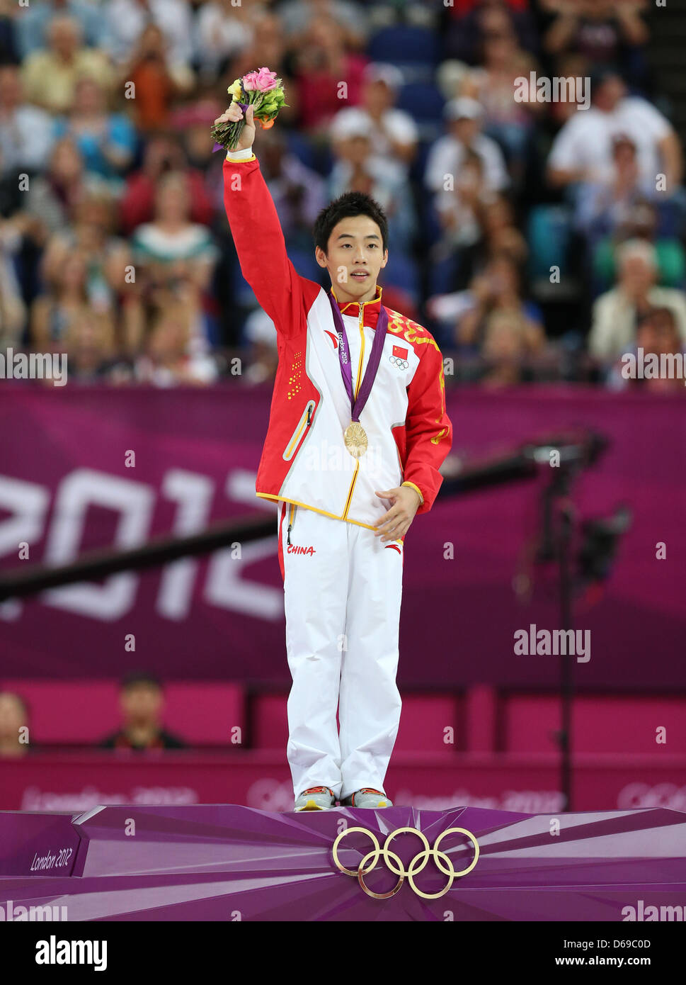 Gold medallist Kai Zou of China celebrates during the medal ceremony ...
