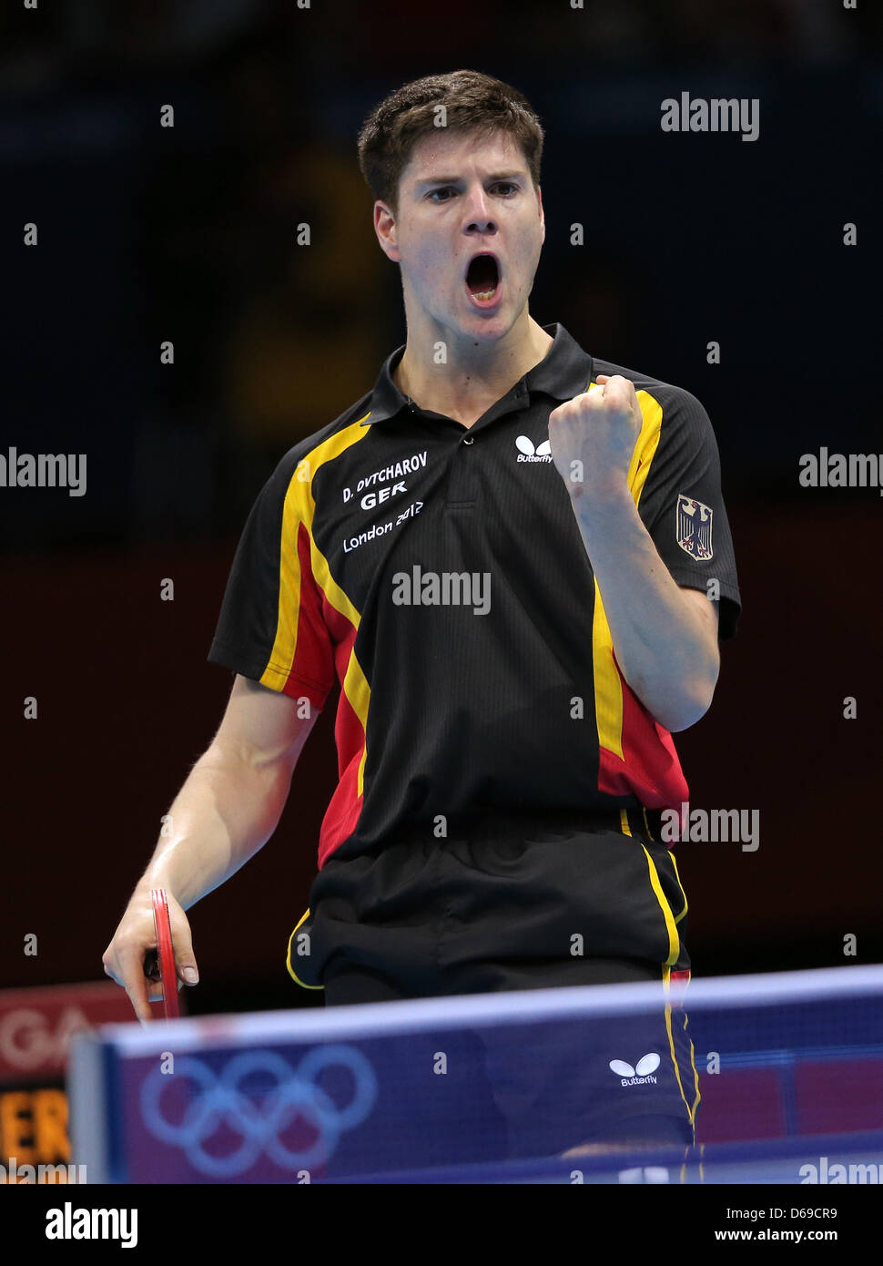 German table tennis Dimitrij Ovtcharov reacts during the match against Lin  of China during men's team semifinal of the table tennis event in ExCeL  Arena at the London 2012 Olympic Games, London,