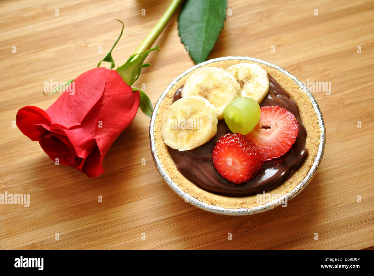 Pudding Fruit Dessert with a Rose Stock Photo
