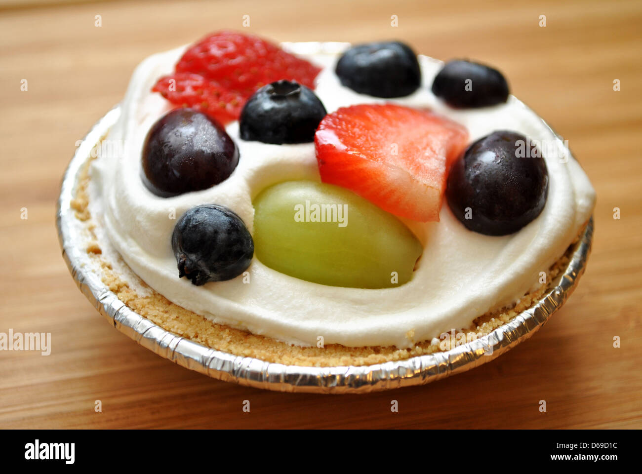 Fruit and Cream Mini Pie for Dessert Stock Photo