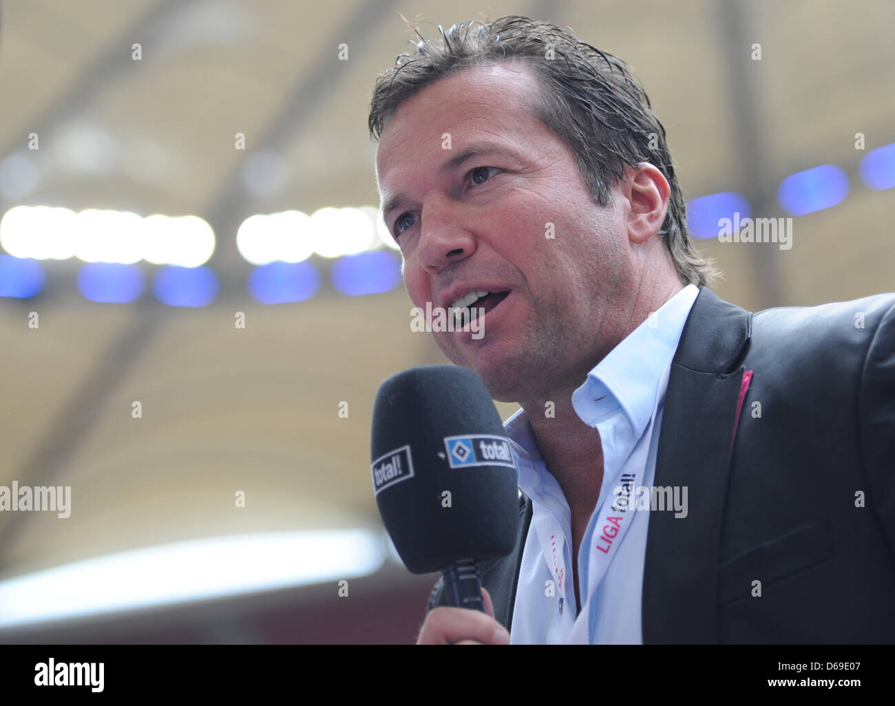 (FILE) An archive photo dated 05 August 2012 shows former soccer pro Lothar Matthaeus giving an interview before the 'Liga total! Cup' match between Hamburg SV and Bayern Munich at Imtech Arena in Hamburg, Germany. Matthaeus will be a television expert. The 1990 world champion soccer player will appear regularly for the top matches of the week on Saturday evening for Sky, according Stock Photo