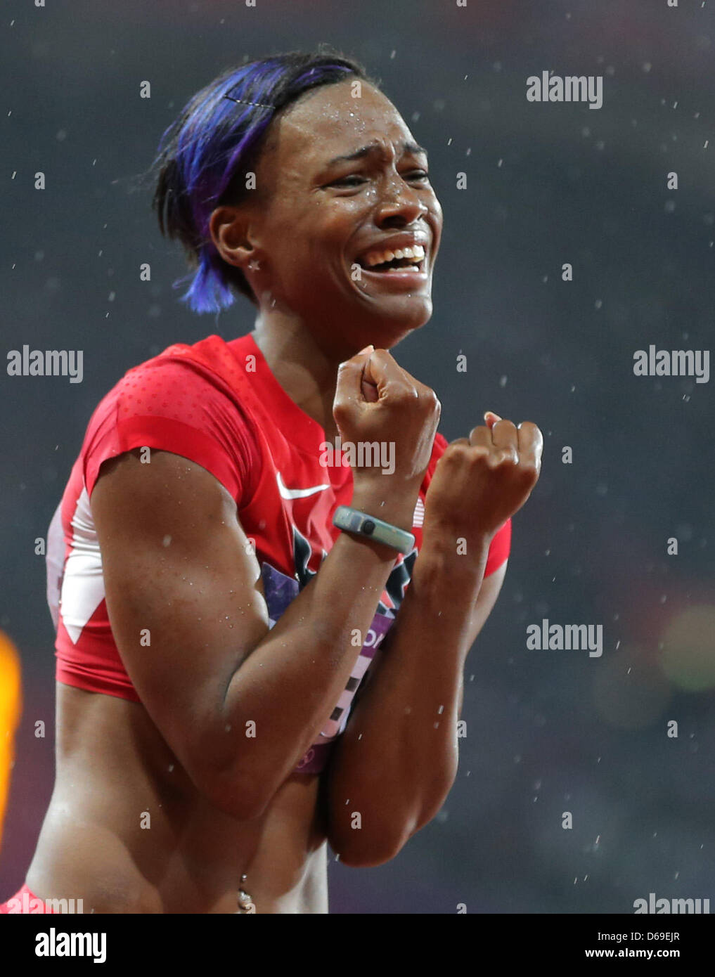 Kellie Wells of USA celebrates after won bronze in the 100m Hurdles
