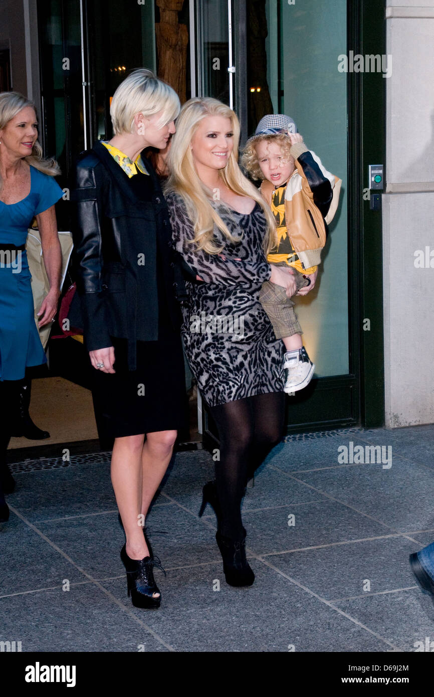 Ashlee Simpson, Jessica Simpson and Bronx Wentz Jessica Simpson holding her nephew as she leaves a Manhattan hotel with her Stock Photo