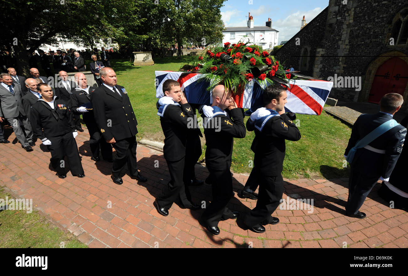 The coffin is carried by the pall bearers for the funeral of Henry Allingham at the Parish Church of St Nicholas' of Myra Stock Photo