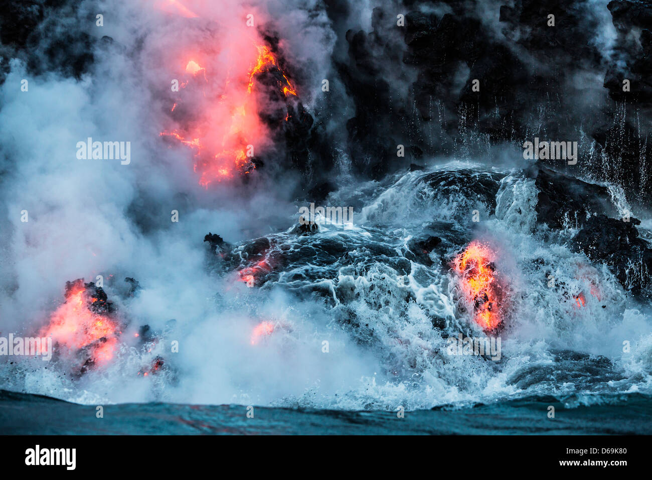 Lava flowing into water Stock Photo Alamy