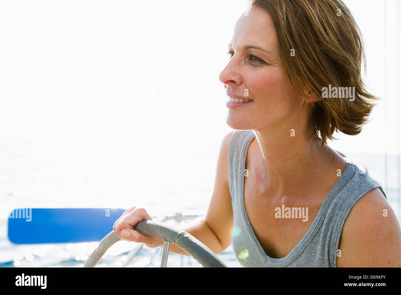 Woman wheel boat hi-res stock photography and images - Alamy
