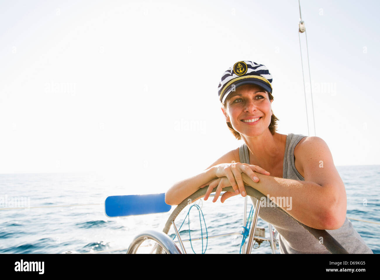 Woman wheel boat hi-res stock photography and images - Alamy