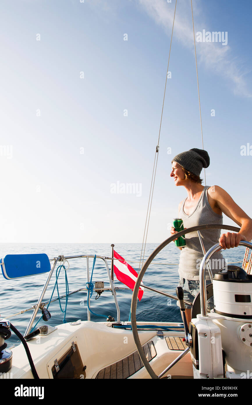 Woman wheel boat hi-res stock photography and images - Alamy