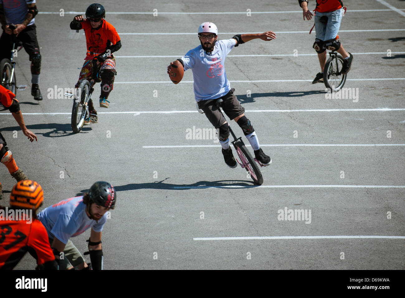 San Marcos, Texas, USA. 14th April, 2013. The Unicychos and the Bierdos play each other for the Unicycle Football League ''Stupor Bowl'' championship game Sunday, April 14, 2013 in San Marcos, TX. Photo@Bahram Mark Sobhani) (Credit Image: Credit:  Bahram Mark Sobhani/ZUMAPRESS.com/Alamy Live News) Stock Photo