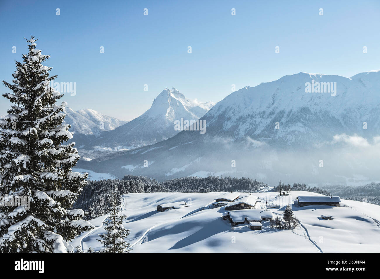 Ski lodge in snowy landscape Stock Photo - Alamy