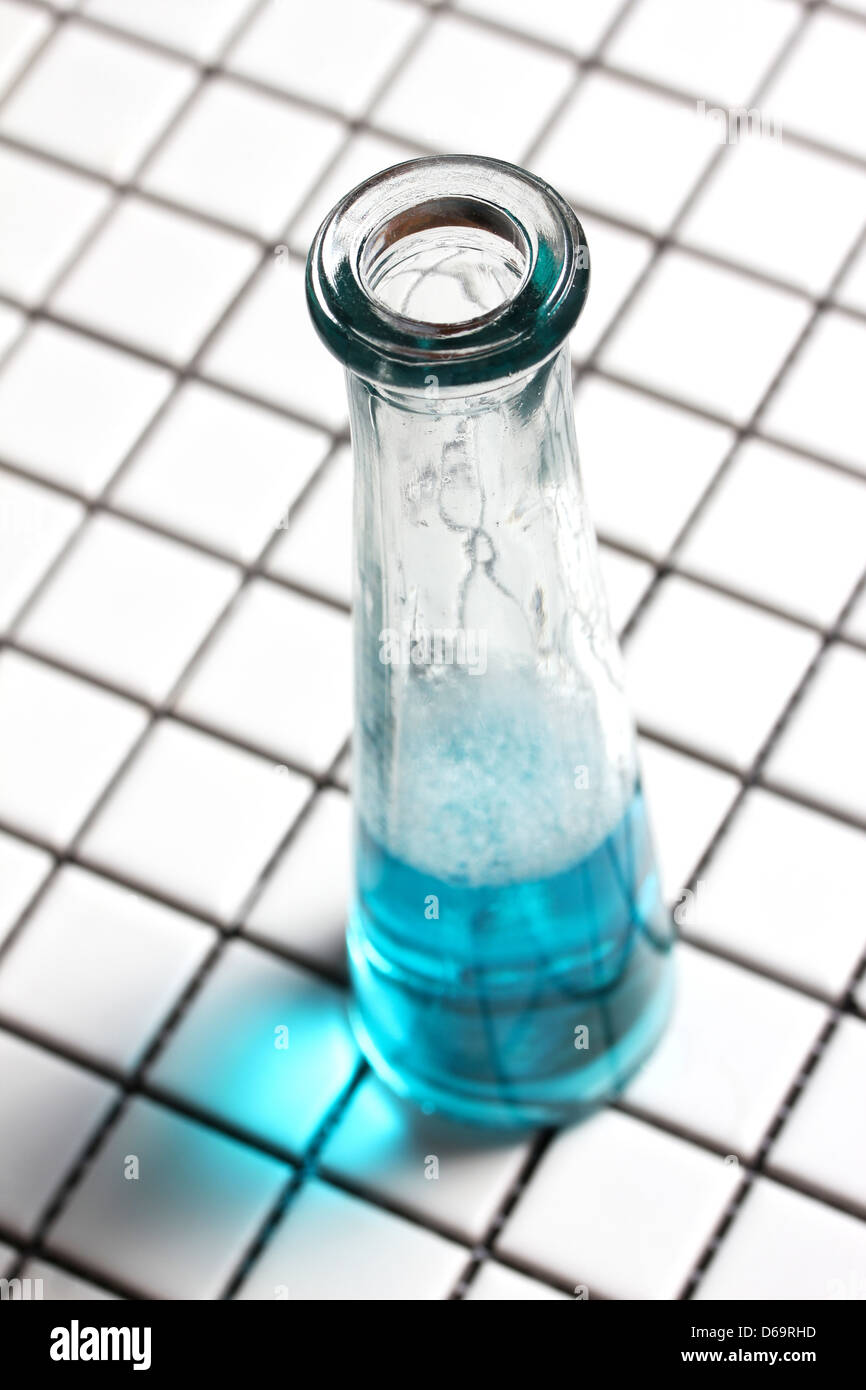 Blue glass test tube flask hi-res stock photography and images - Alamy