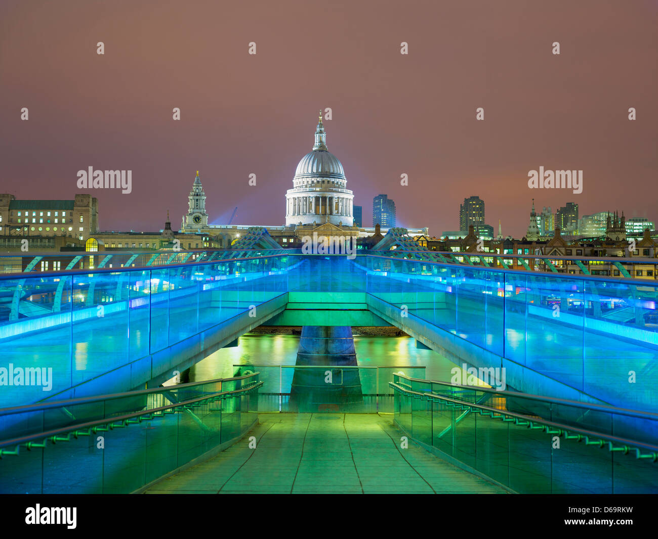 Illuminated bridge and parliament building Stock Photo