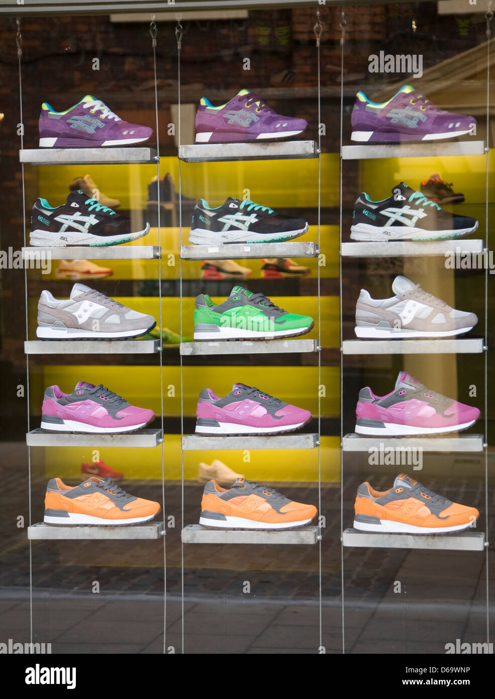 Trainers on display in shop hi-res stock photography and images - Alamy