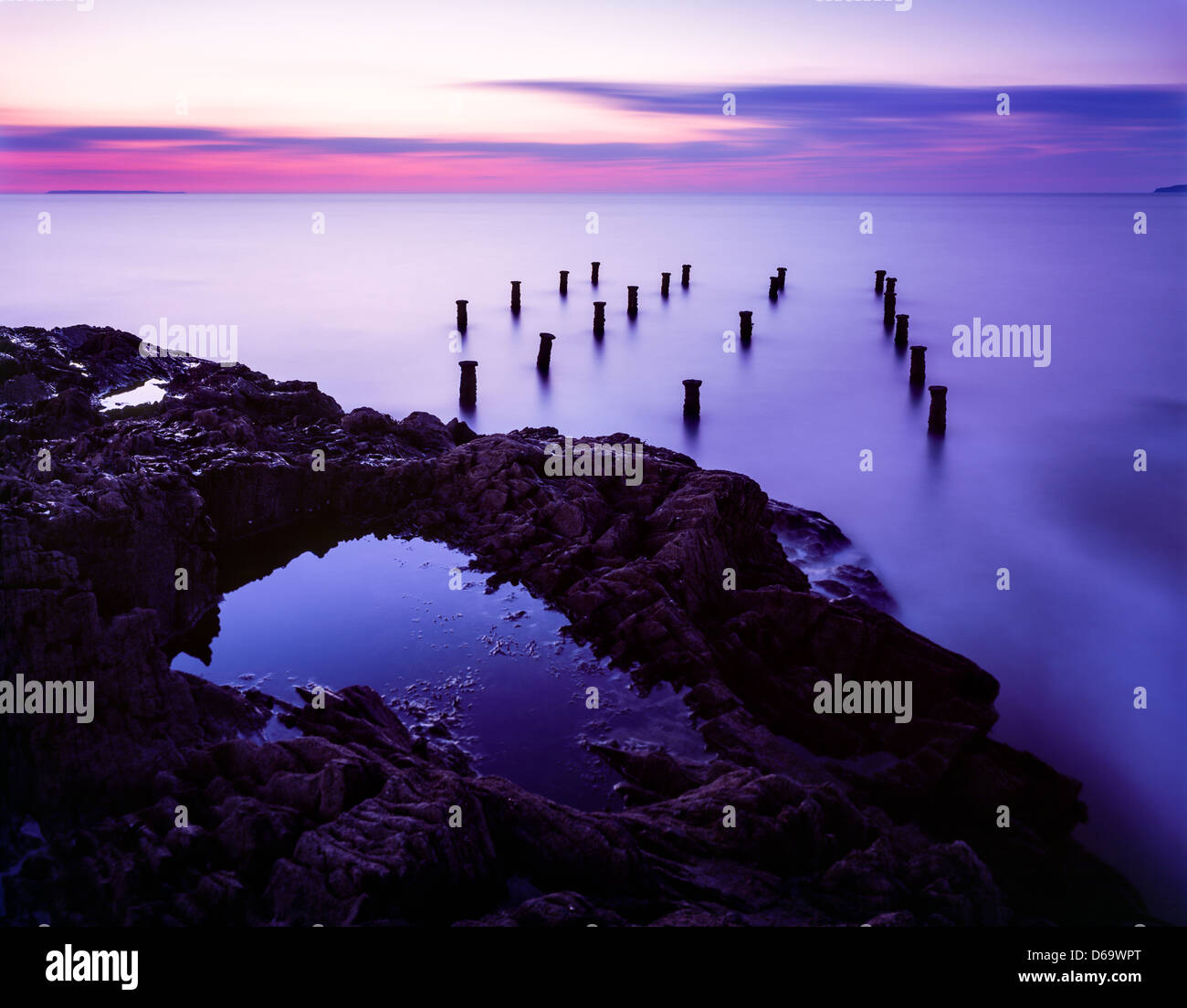 The remains of the old pier at Westward Ho! at low tide, North Devon ...