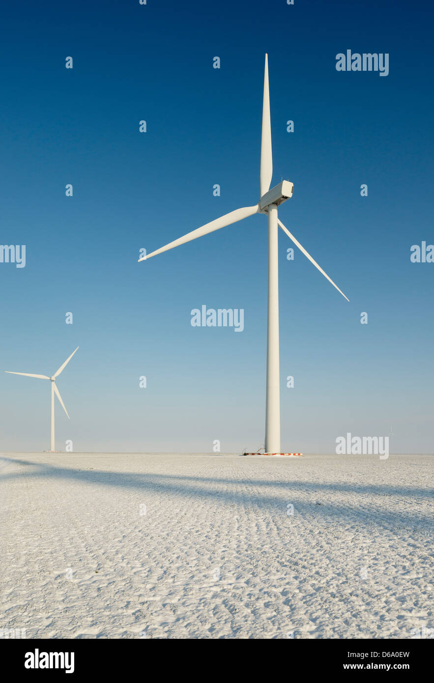 Wind turbines in snowy landscape Stock Photo
